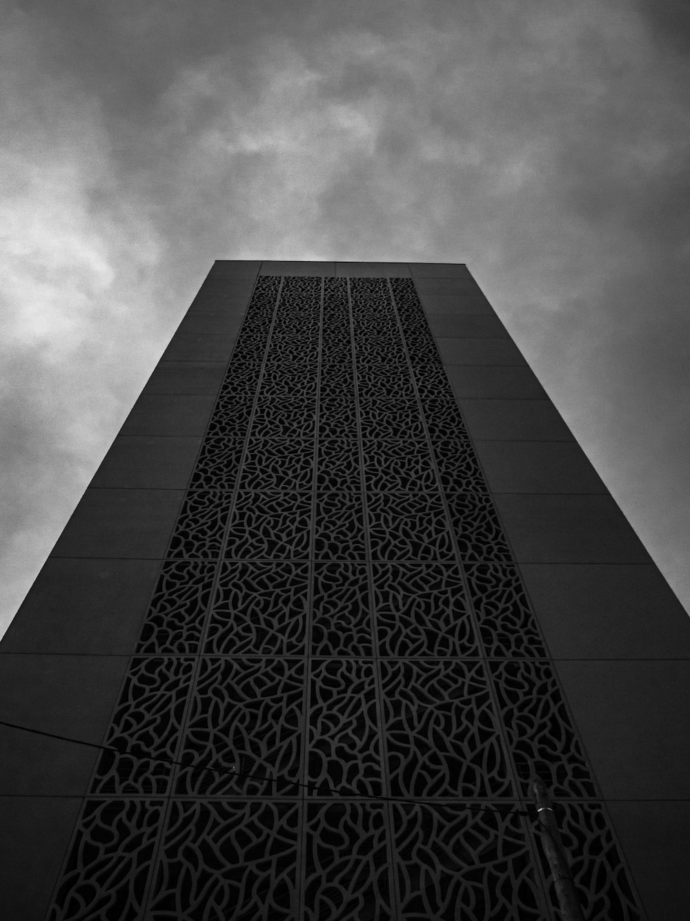 grayscale photo of concrete building