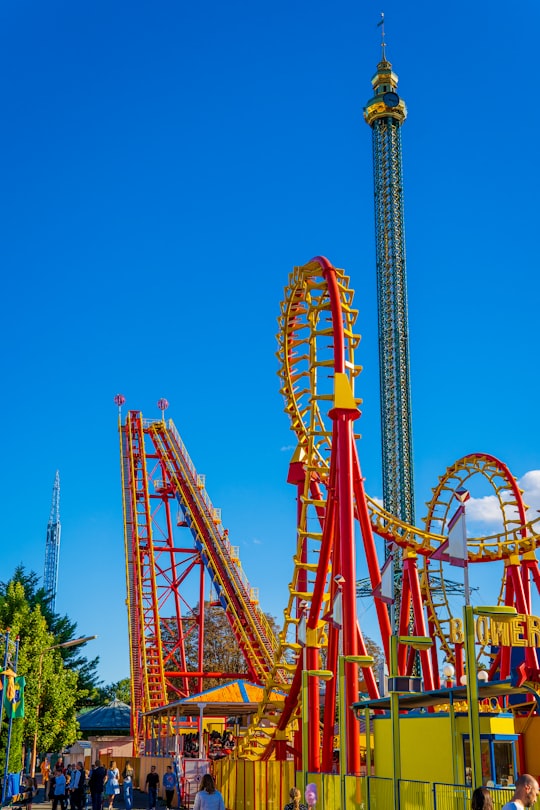 red and yellow roller coaster in Prater Austria