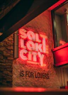 a neon sign that says salt lake city is for lovers