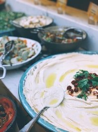 white cream on blue ceramic bowl