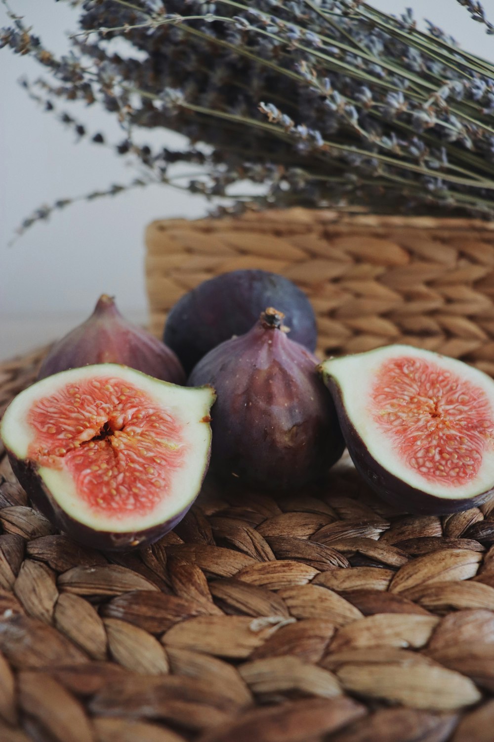 brown and white fruit on brown woven surface