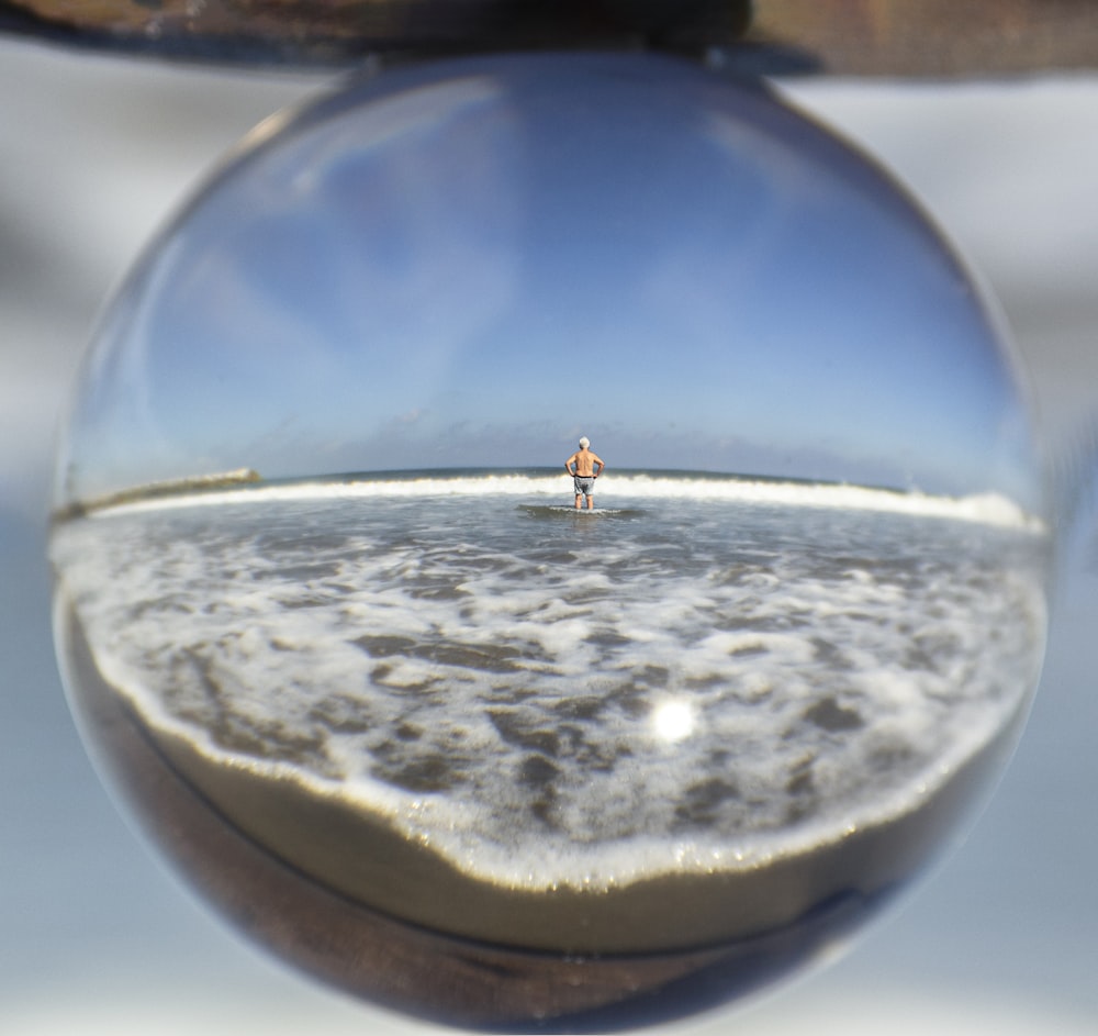 water drop on brown wooden table