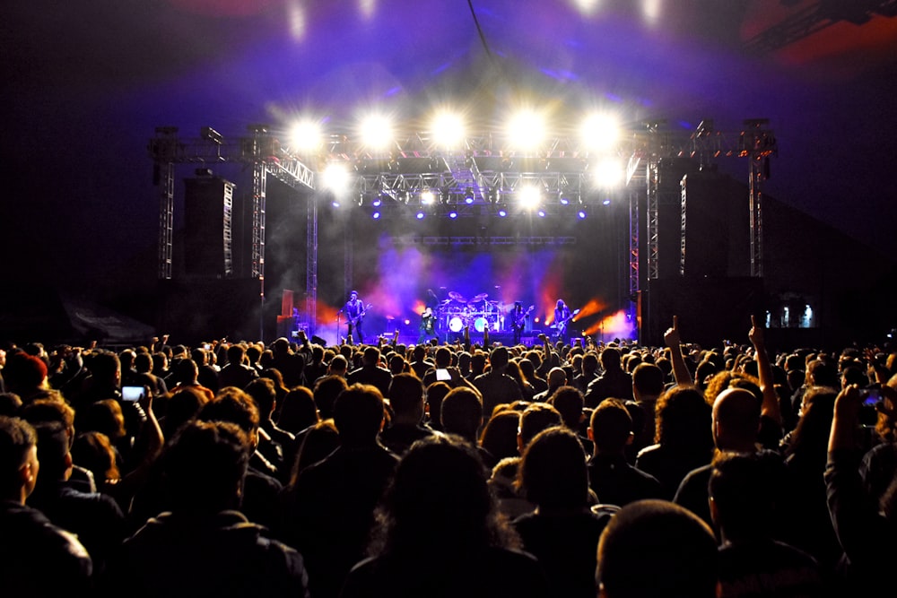 people watching concert during night time