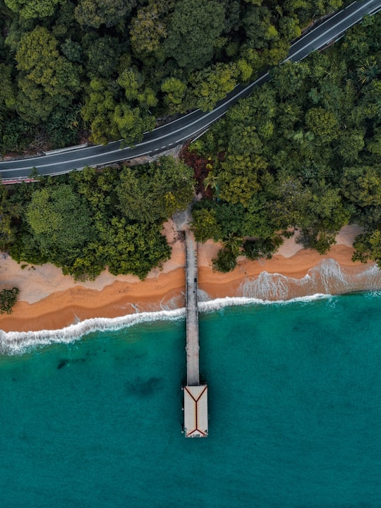 aerial view of people on beach during daytime in Pulau Pangkor Malaysia
