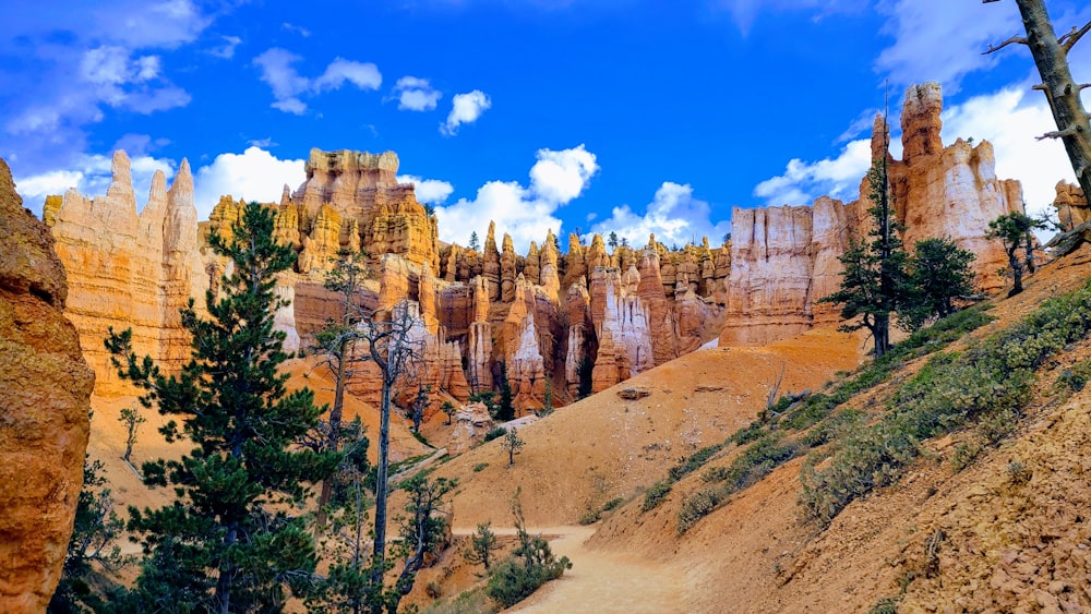 brown rocky mountain under blue sky during daytime