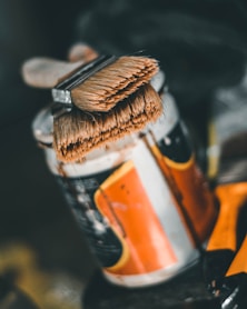 orange and white labeled bottle