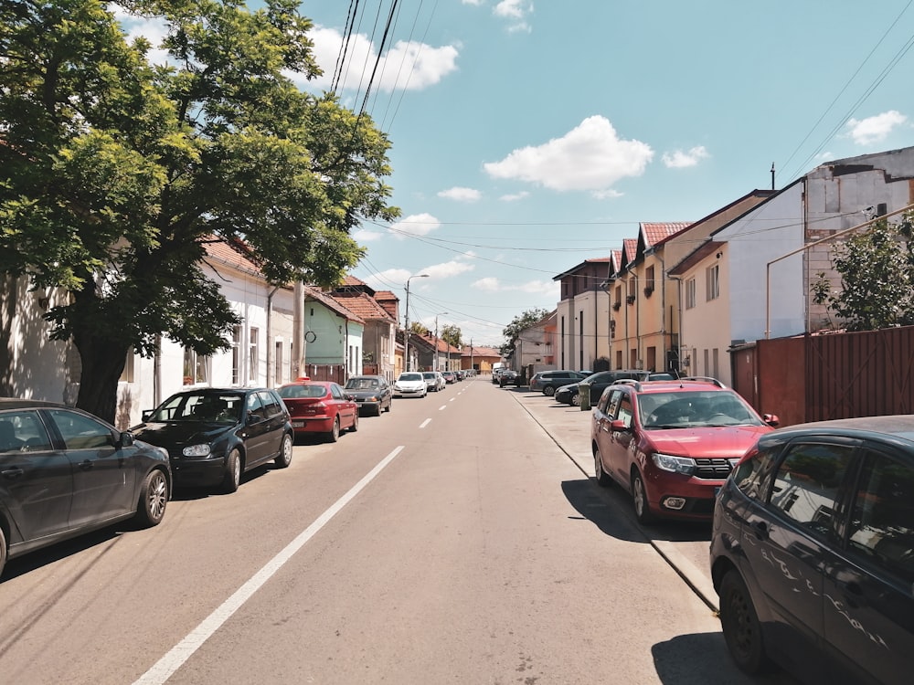 cars parked on side of the road during daytime