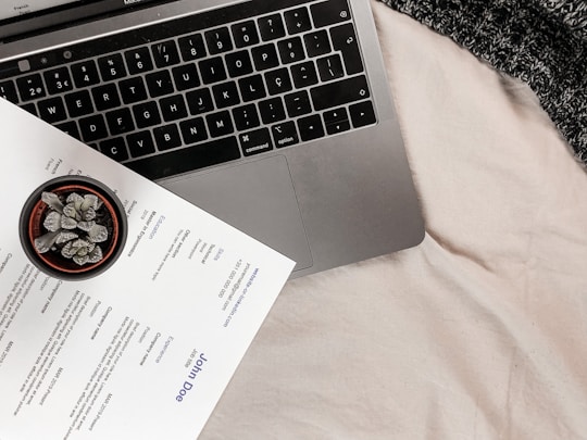 Resume and a laptop, photo by João Ferrão