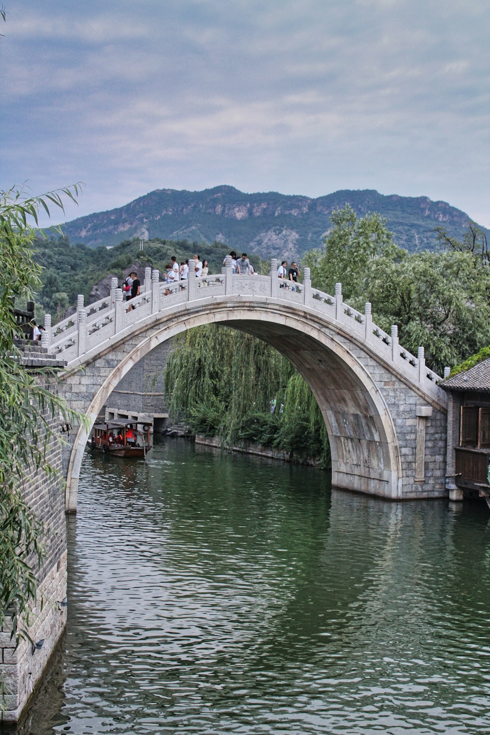 white concrete bridge over river during daytime