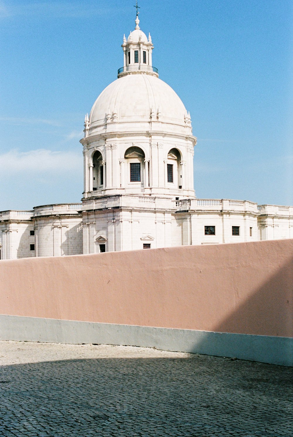 white concrete building under blue sky during daytime