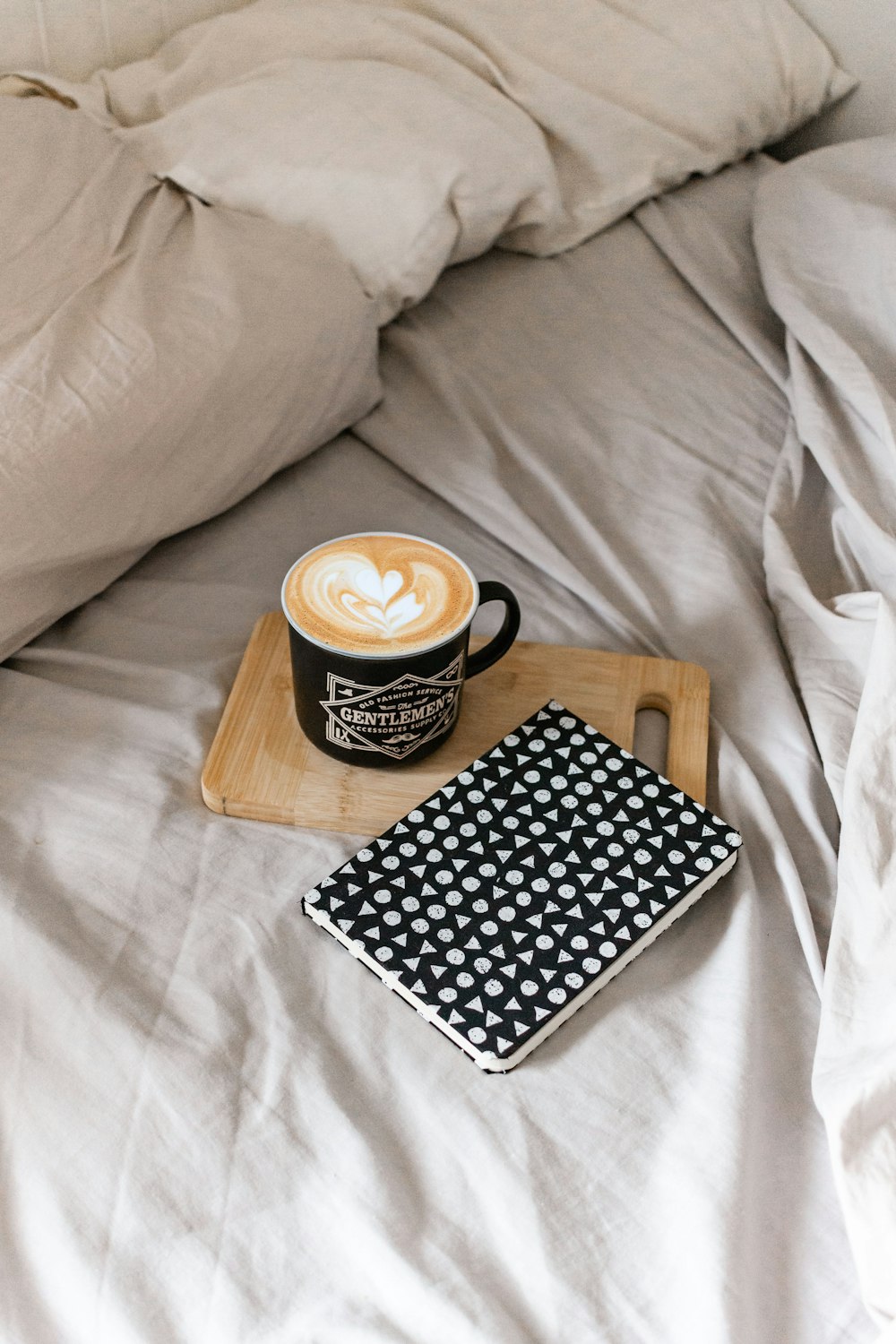 black and white ceramic mug on black and white book