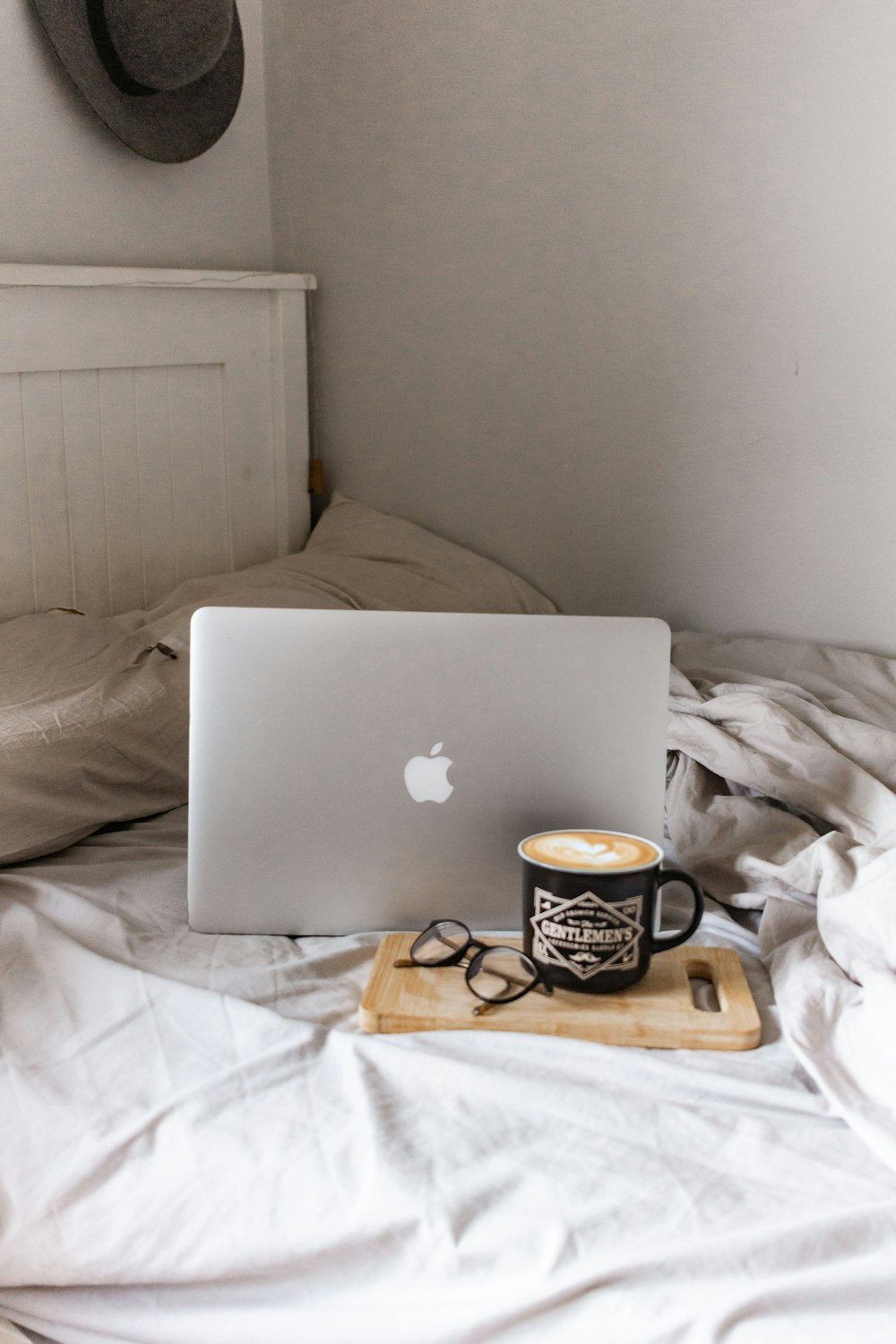 macbook air on white textile