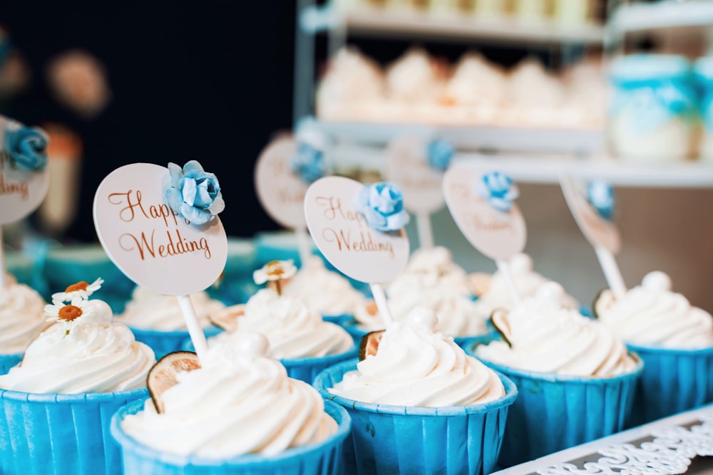 white cupcakes on white tray