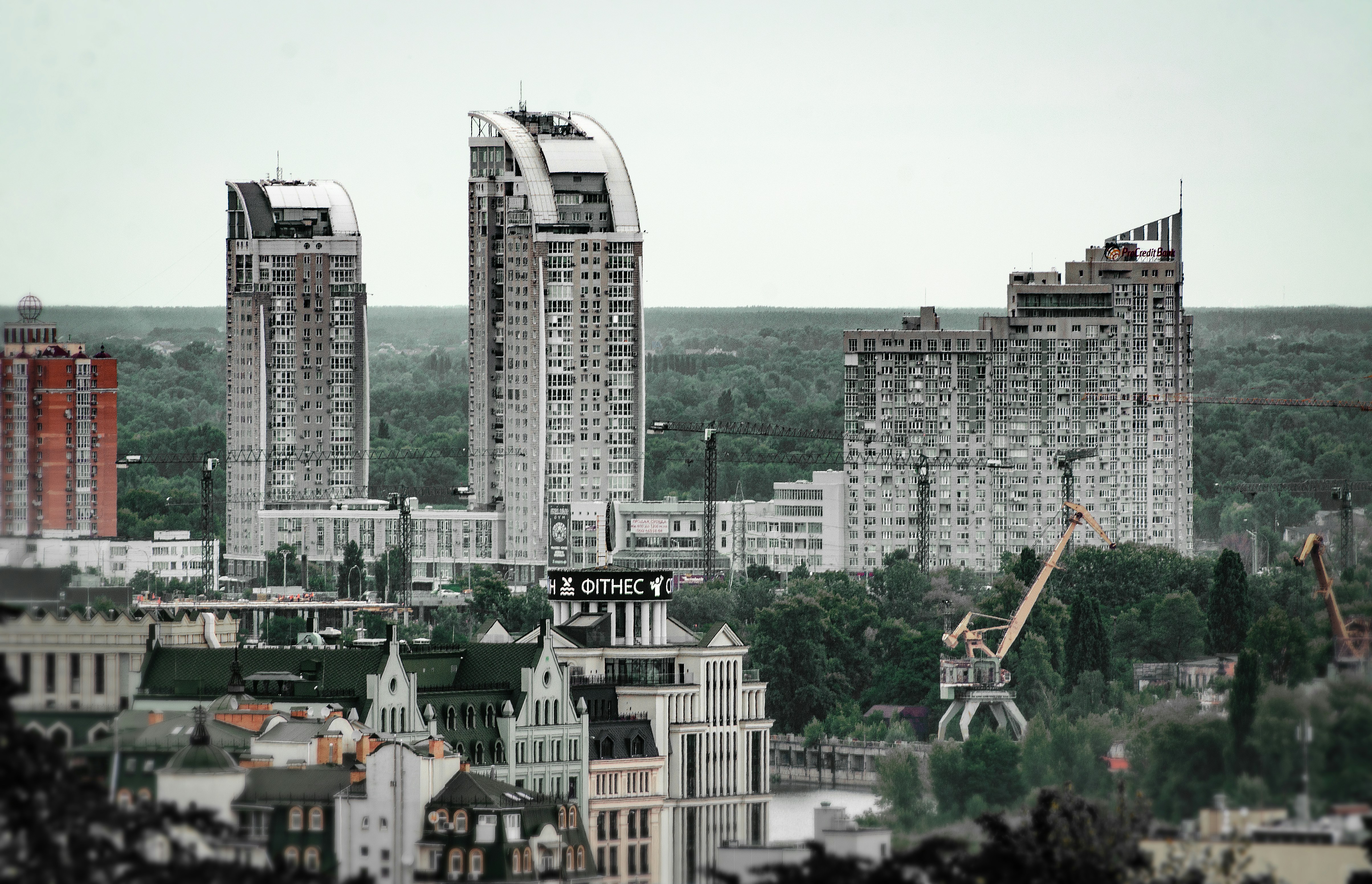 white concrete building near body of water during daytime