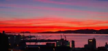 Sunset over a newly built apartment complex near the harbor.