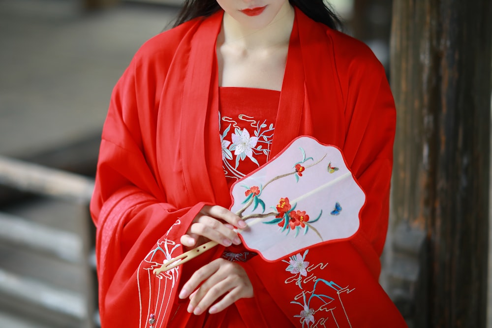 woman in red and white kimono