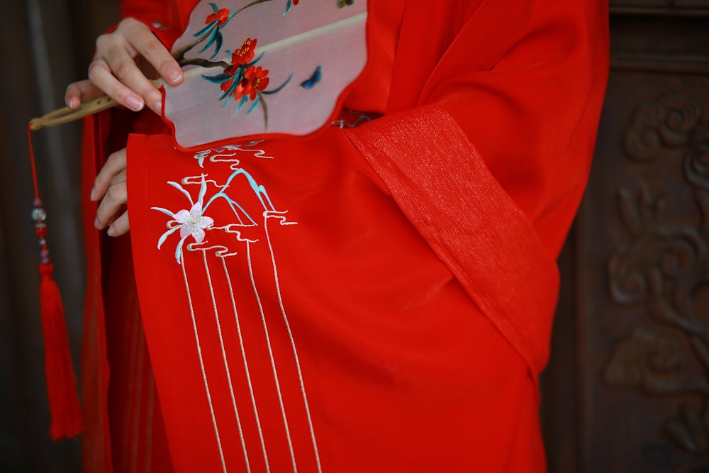 red and white floral textile