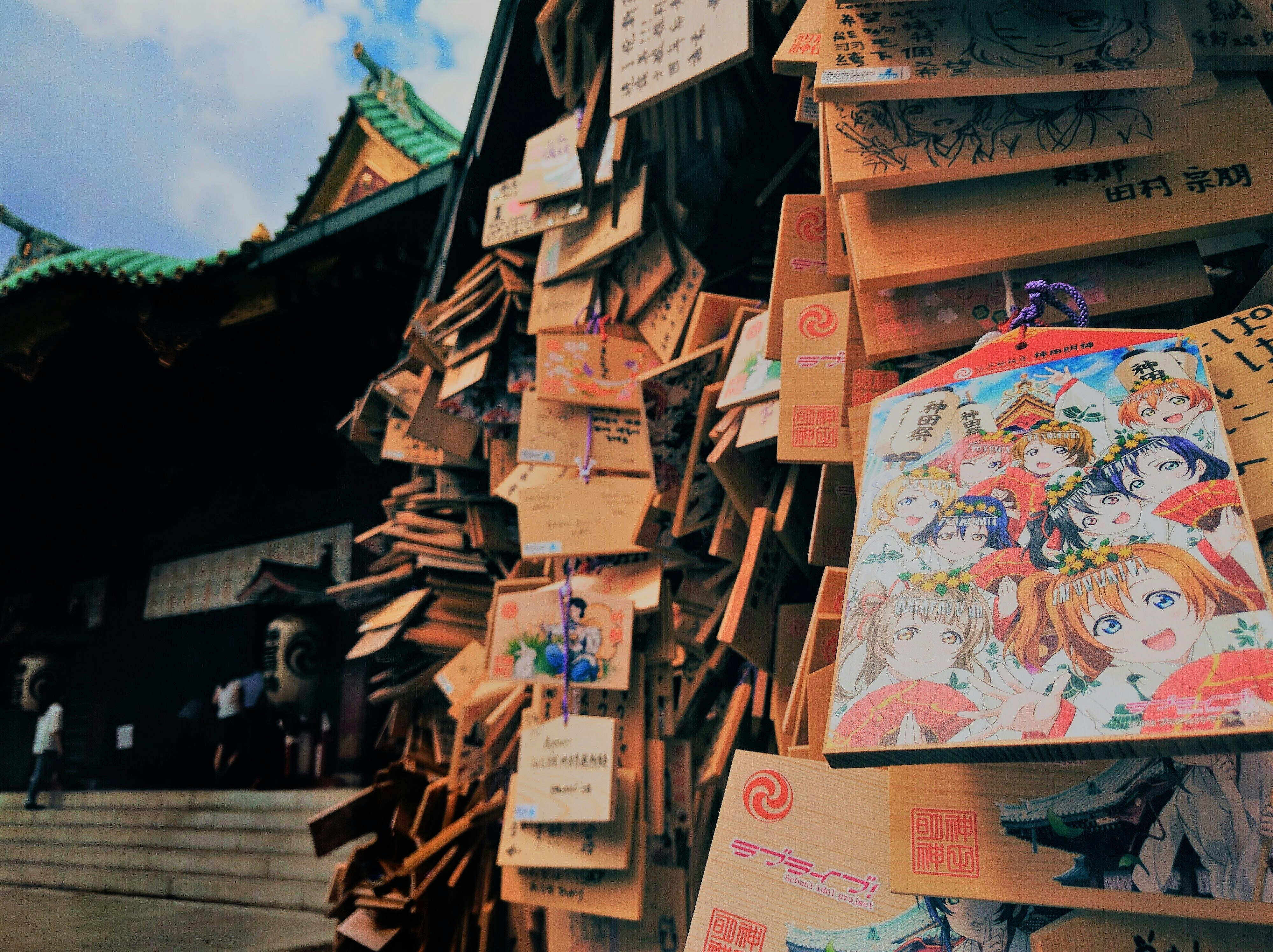 Taken in Kanda Myoujin Shrine, Tokyo, an old Japanese temple which used to cooperate with a famous anime Love Live! (the pic in Ema)