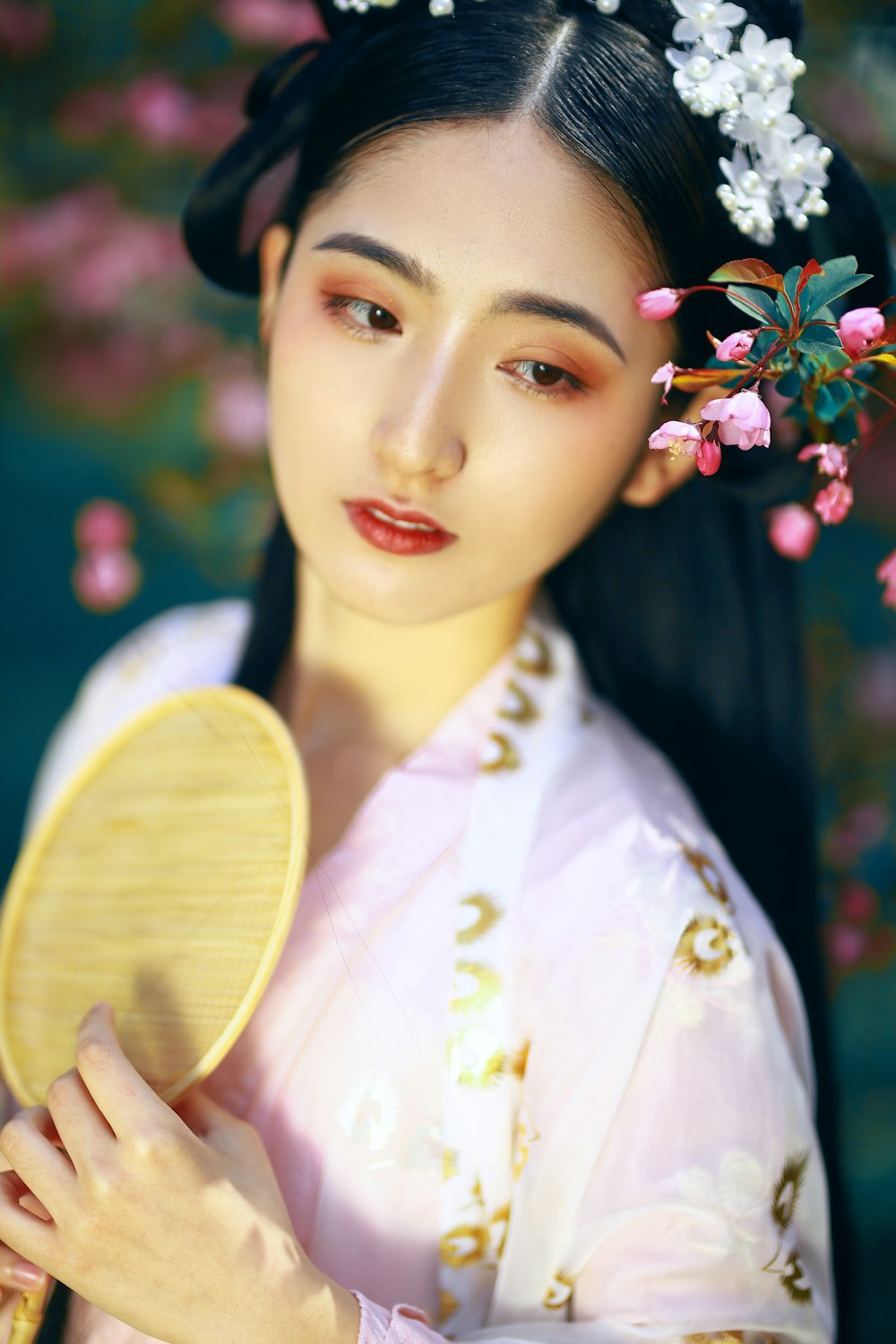 woman in white and yellow floral dress