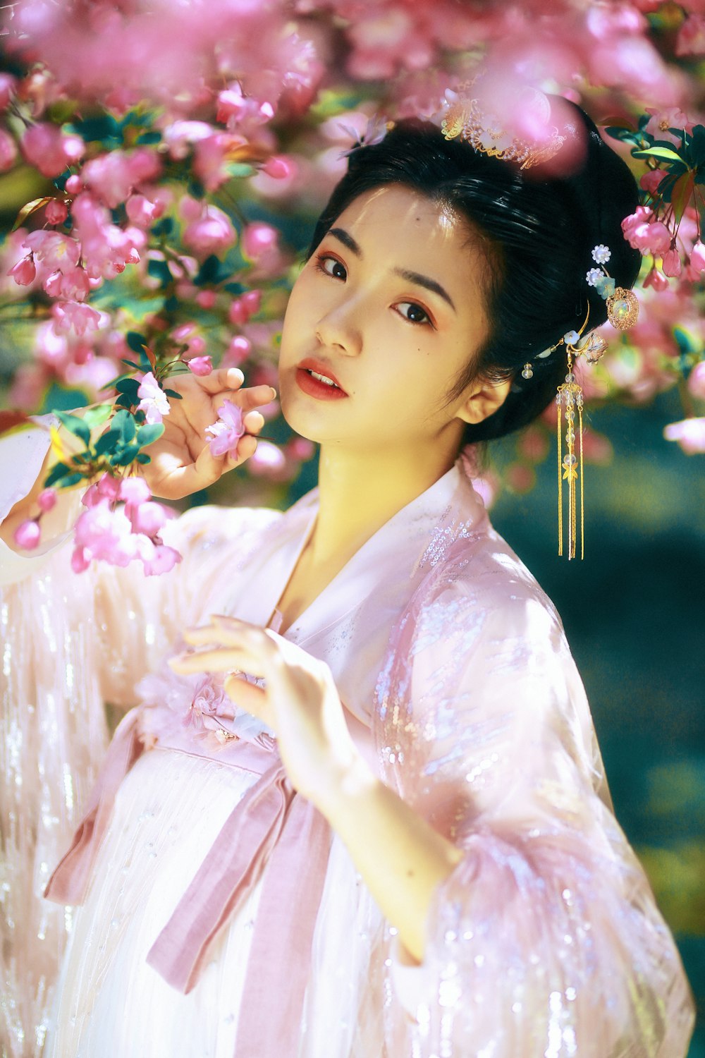 woman in pink and white floral dress