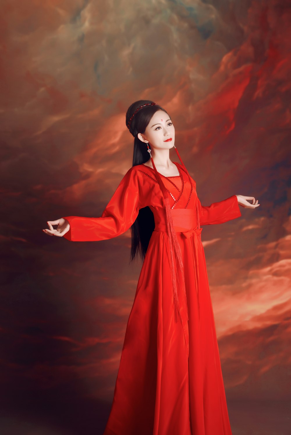 woman in red long sleeve dress