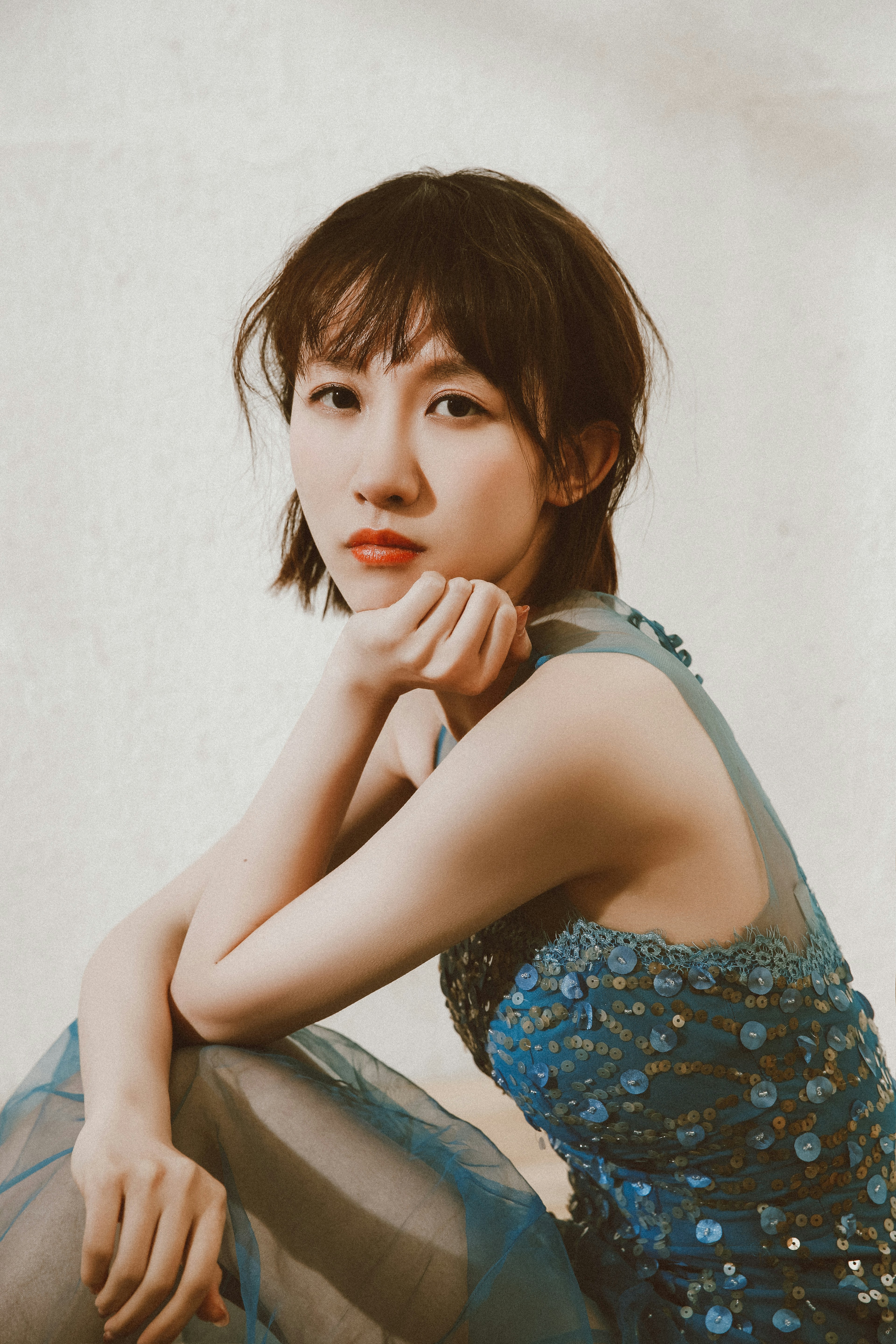 Woman in blue and white floral tank top photo Free Grey Image on Unsplash