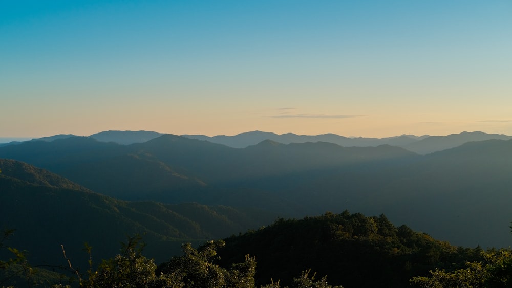 green mountains under blue sky during daytime