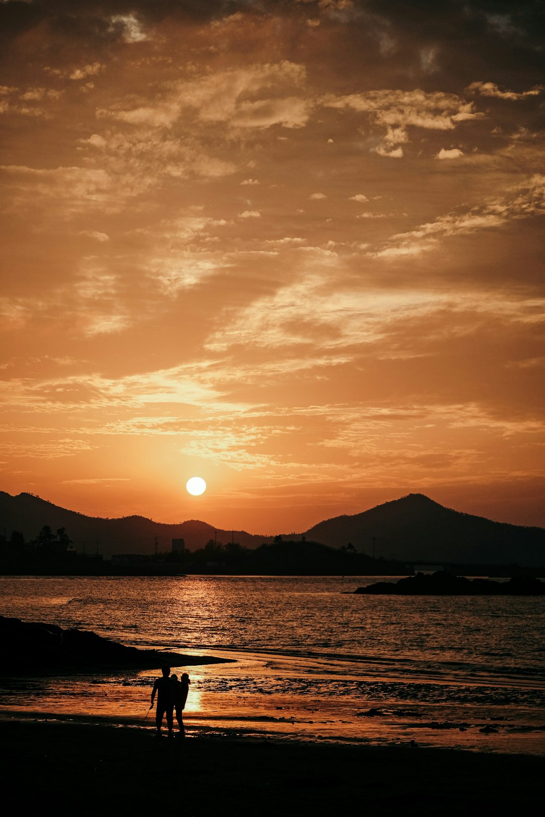 silhouette of mountain during sunset