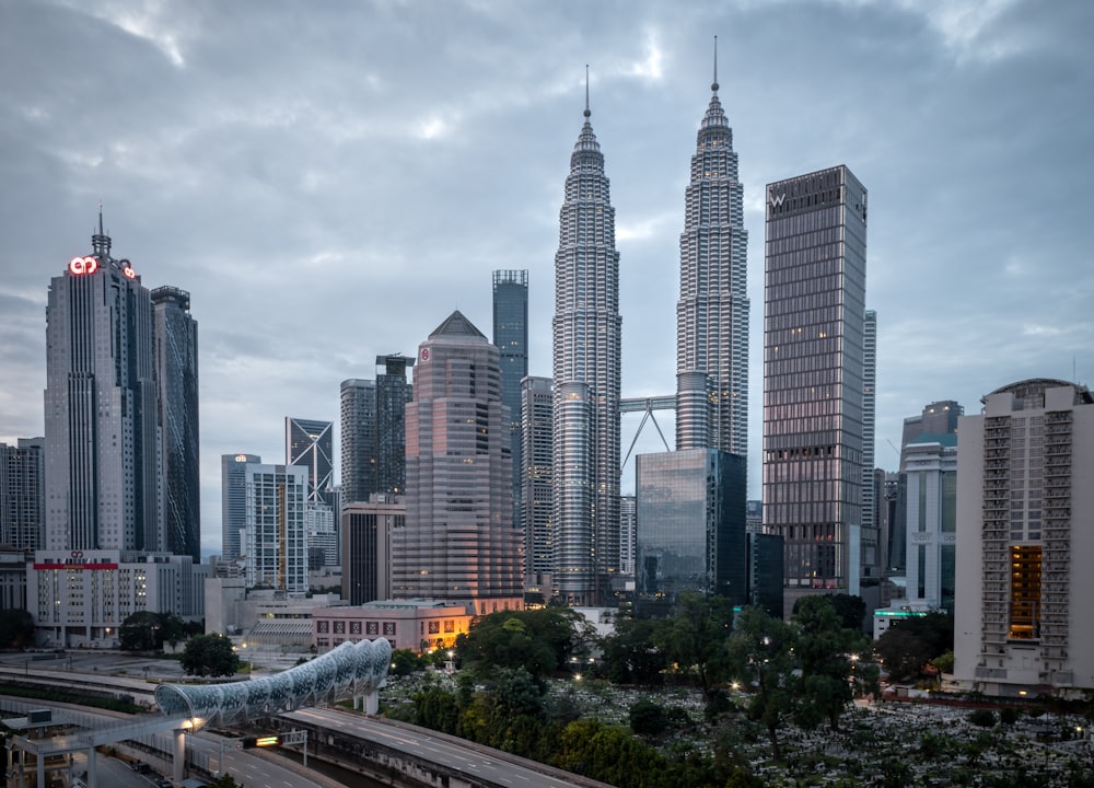 city buildings under white cloudy sky during daytime