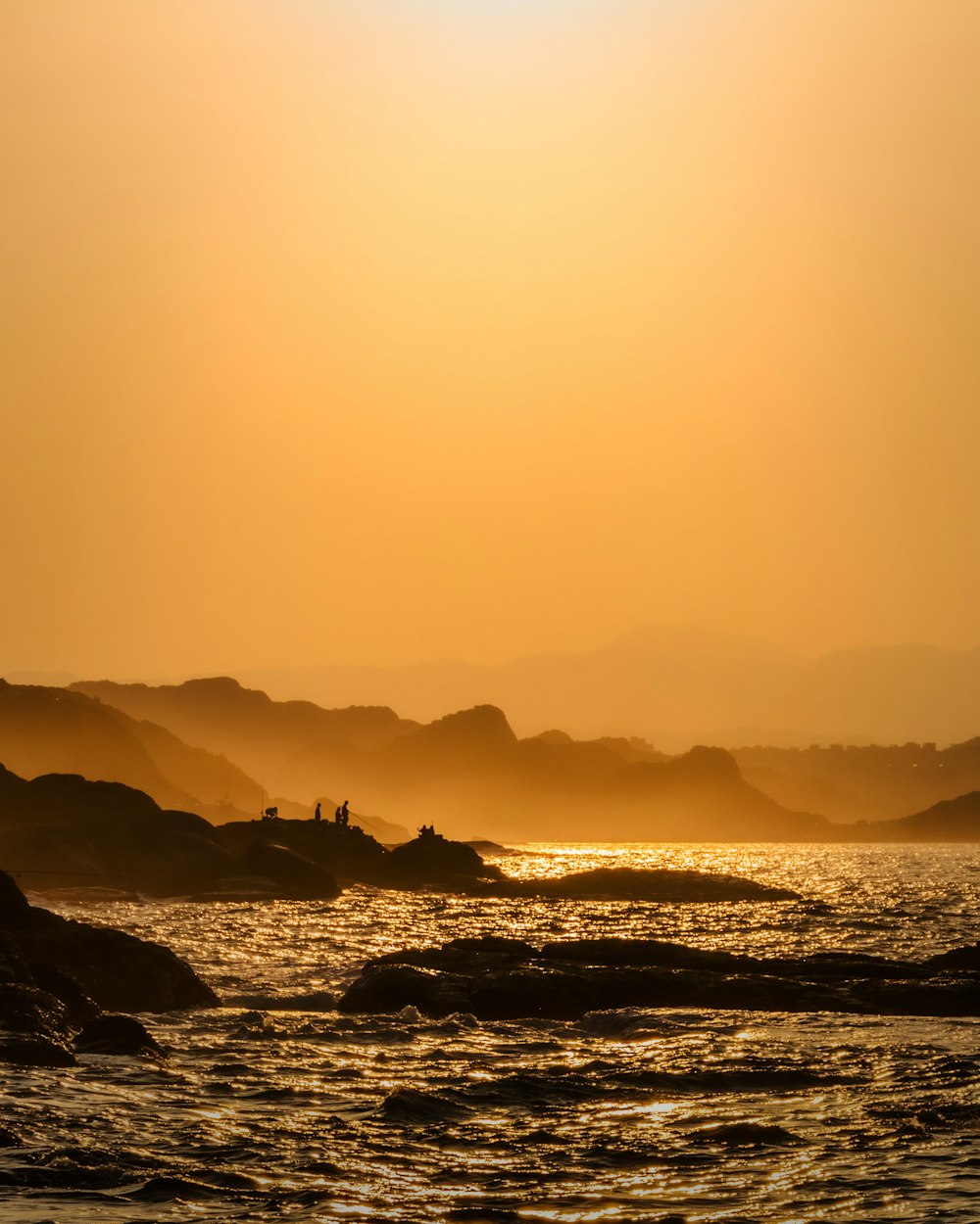 silhouette of mountain during sunset