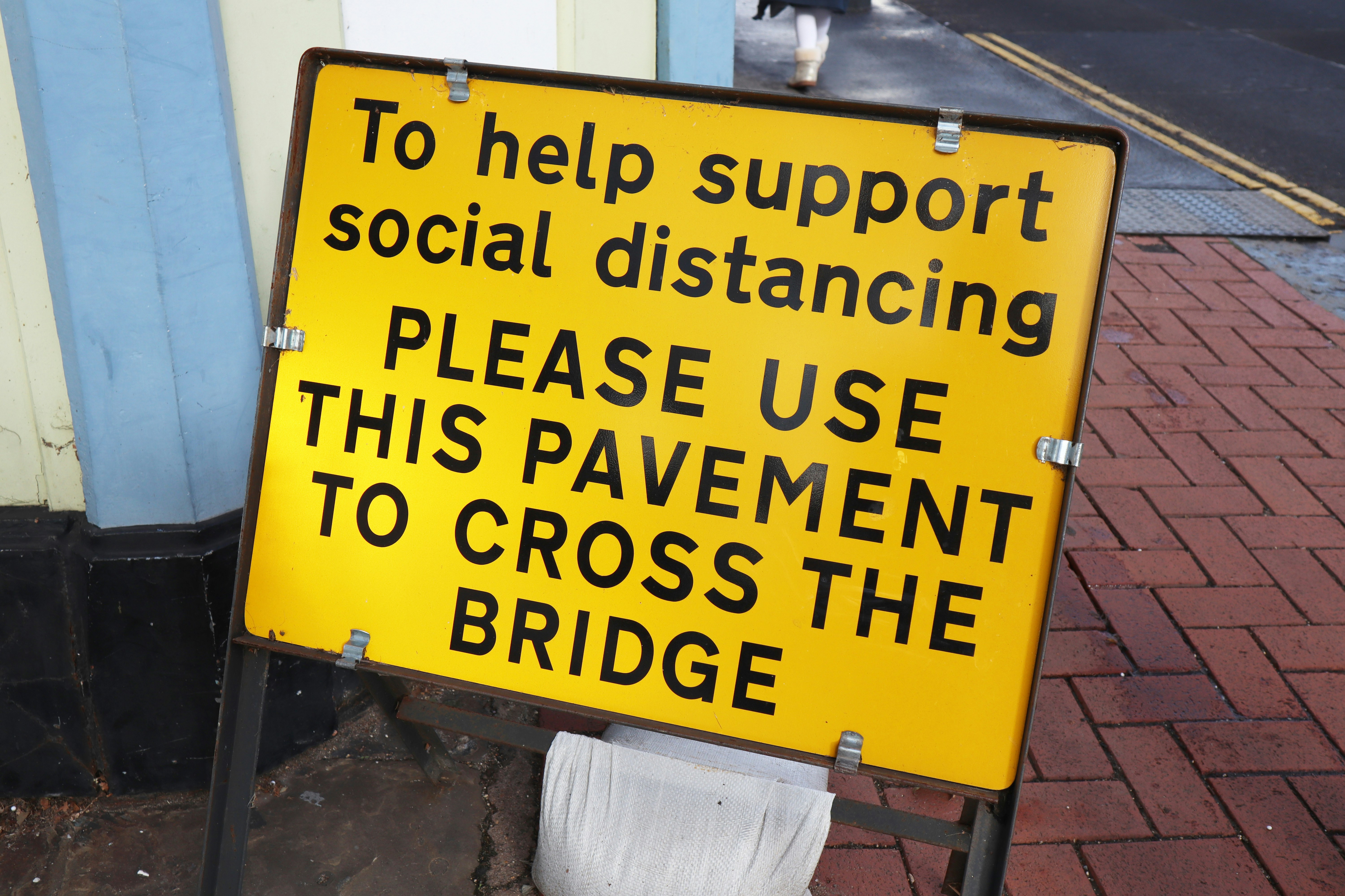yellow and black caution wet floor sign