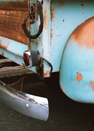 Old red and white tank truck, symbolizing aging and maintenance in male hormone health.