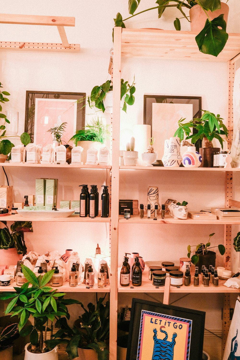 white wooden shelf with bottles