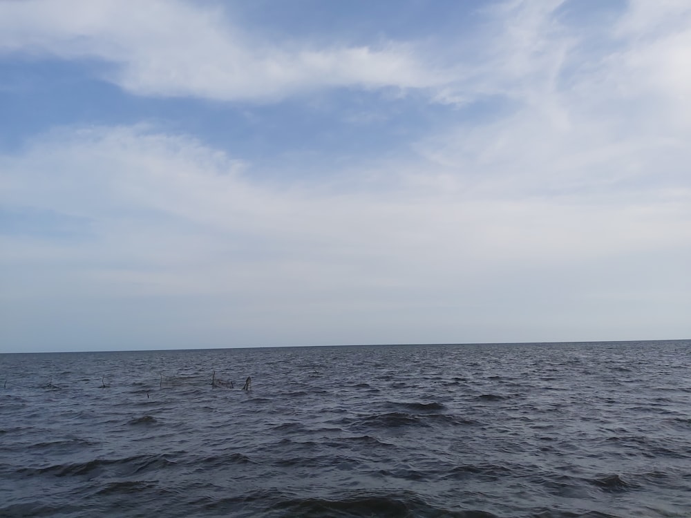 blue sea under blue sky during daytime