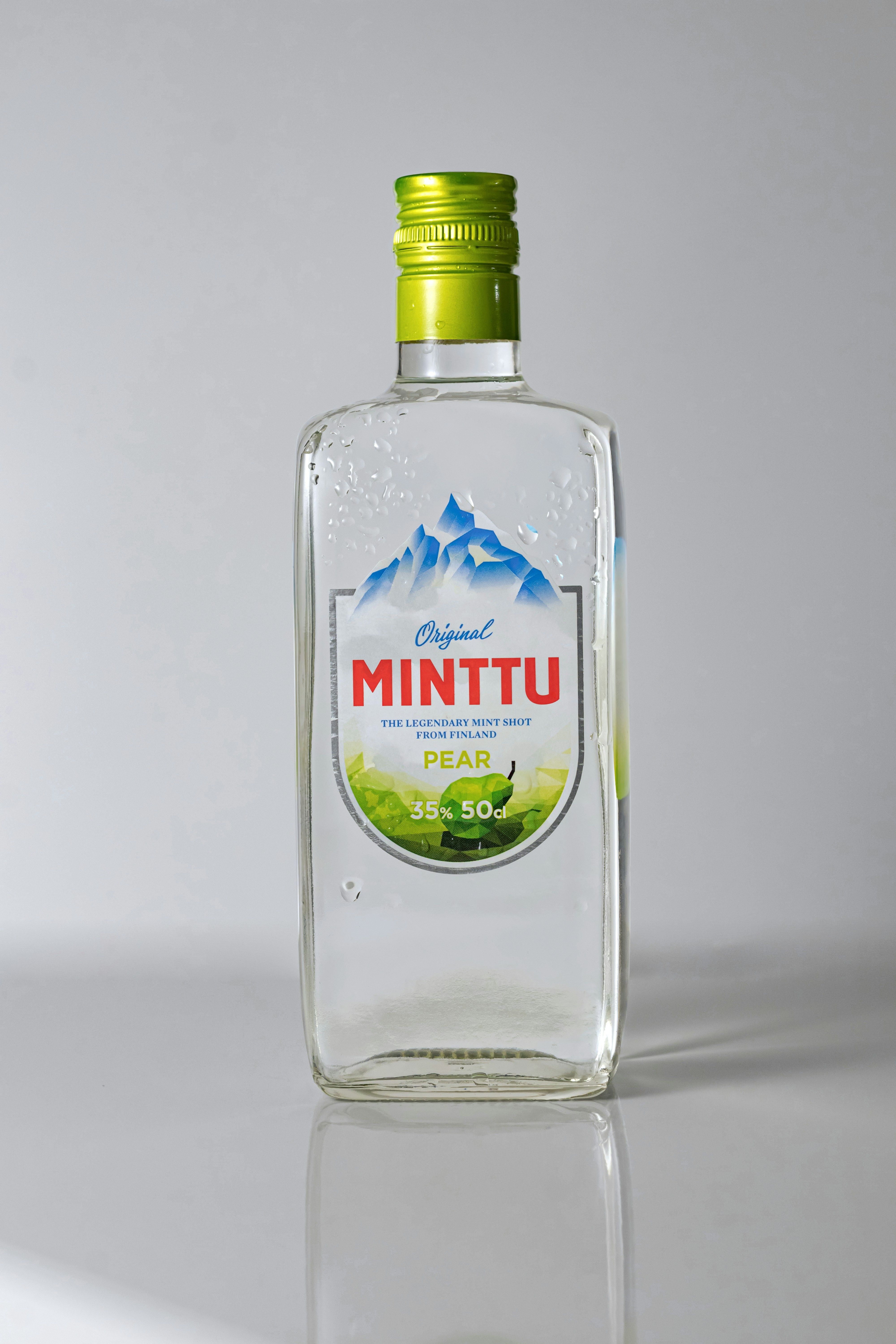 clear plastic bottle on white table
