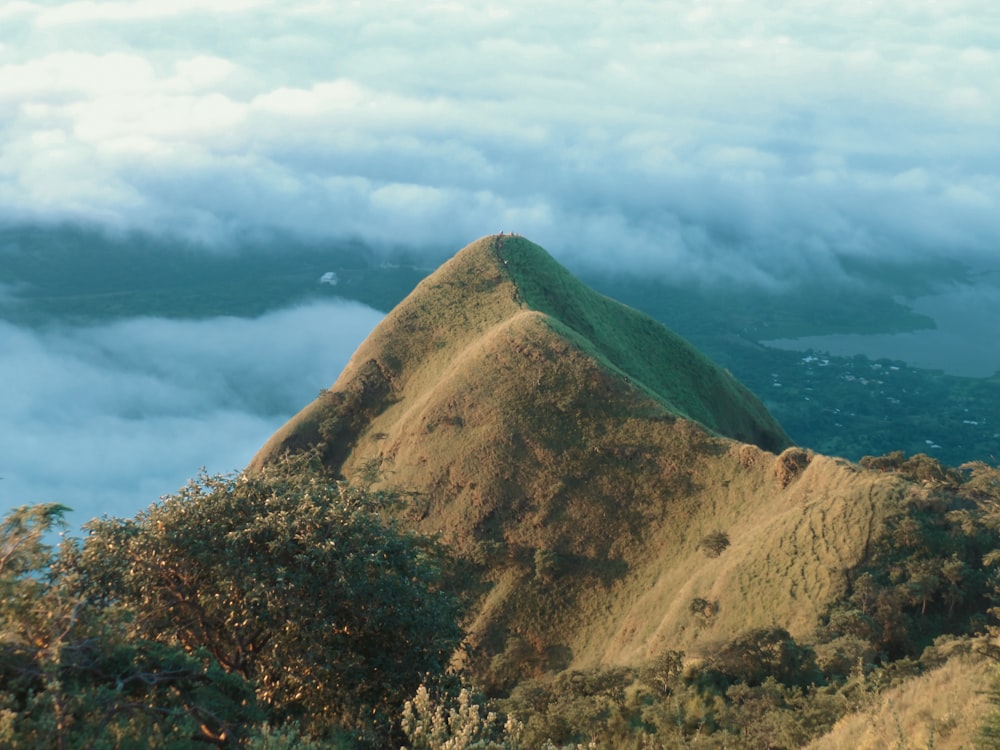 brown mountain under blue sky during daytime