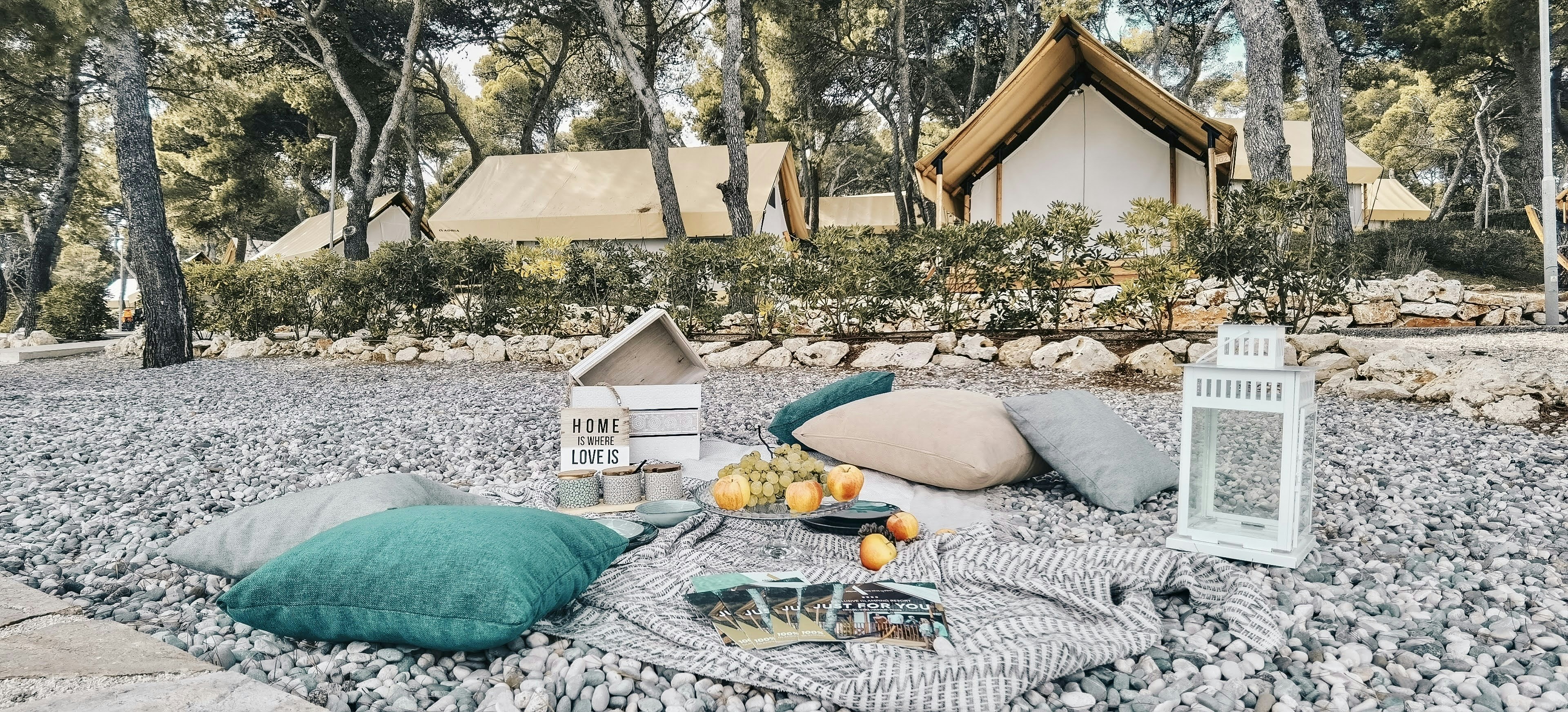 white and brown house miniature on bed