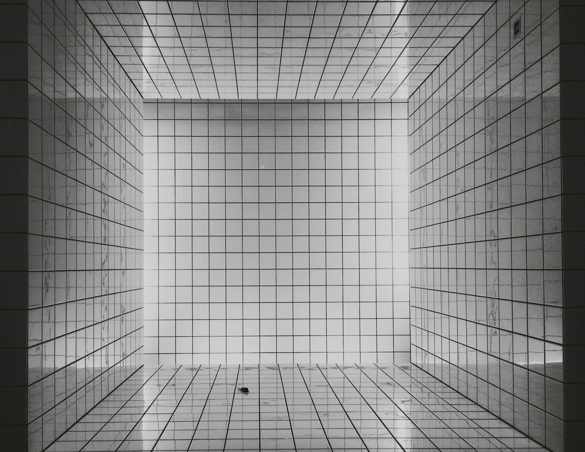 white and gray tiled room