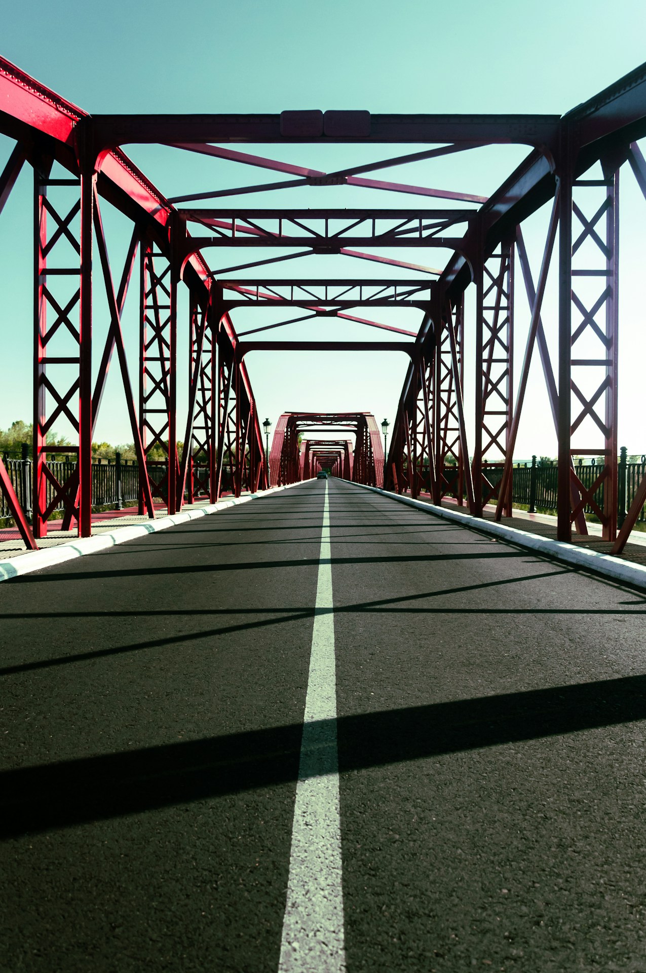 red metal bridge during daytime