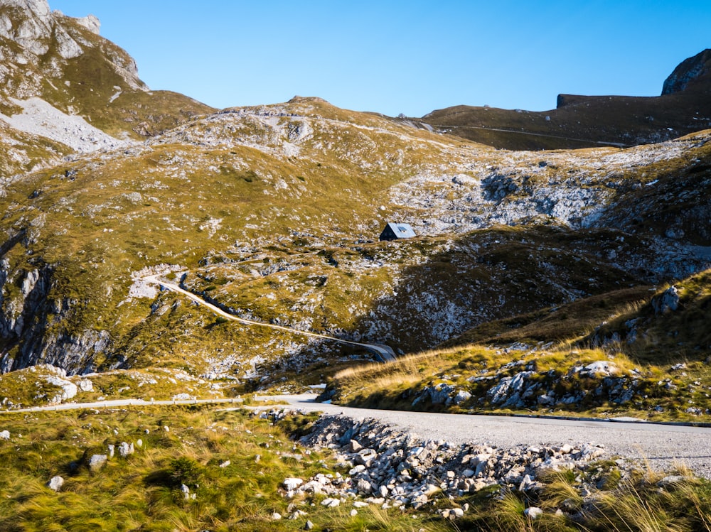 brown and green mountains under blue sky during daytime