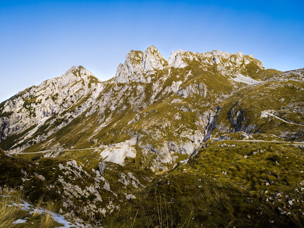 green and white mountains under blue sky during daytime