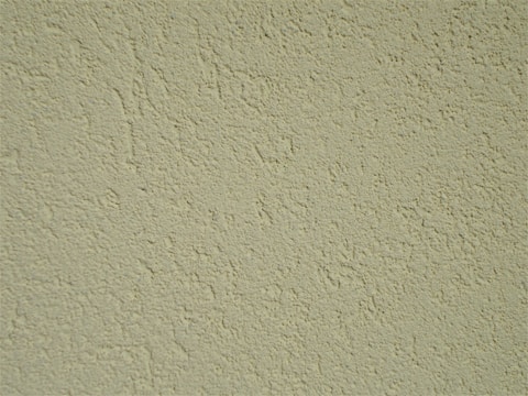 A close-up of textured drywall finish.