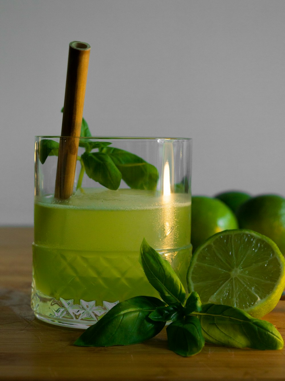 green juice in clear drinking glass