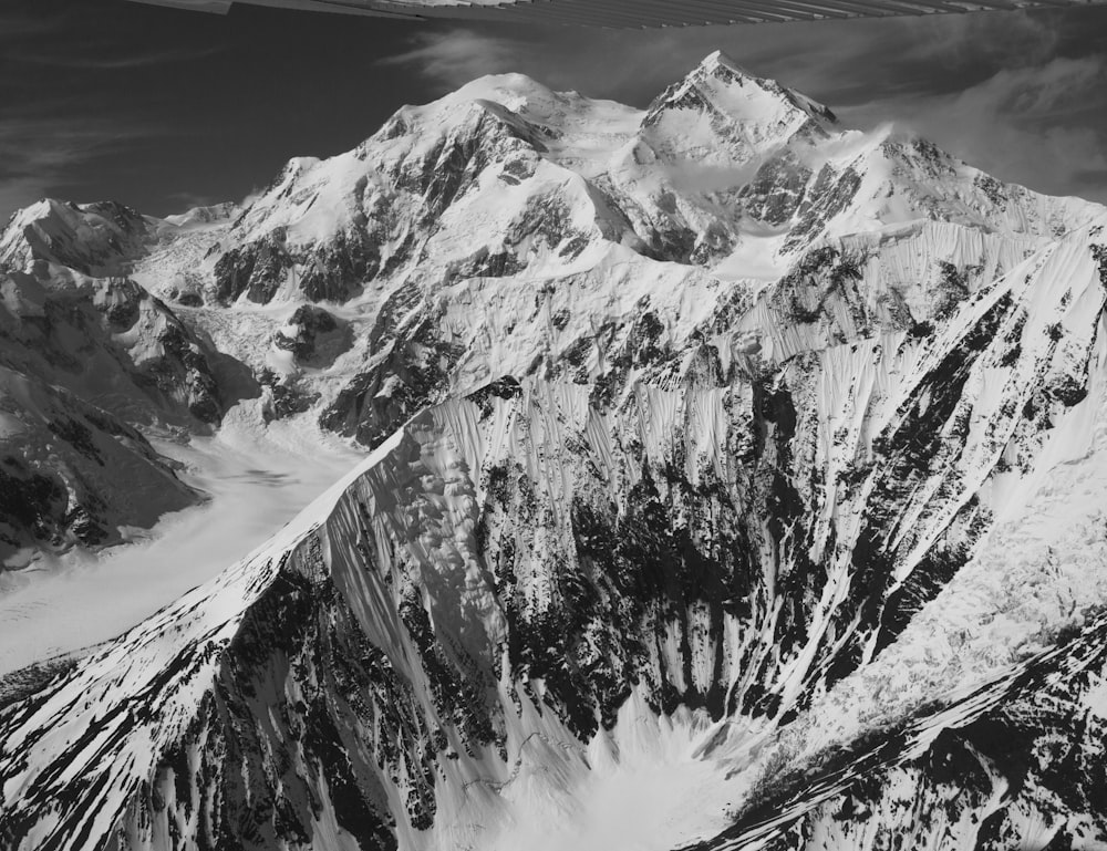 grayscale photo of snow covered mountain