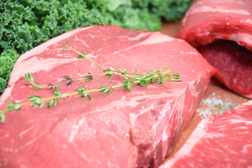 green leaf on red meat