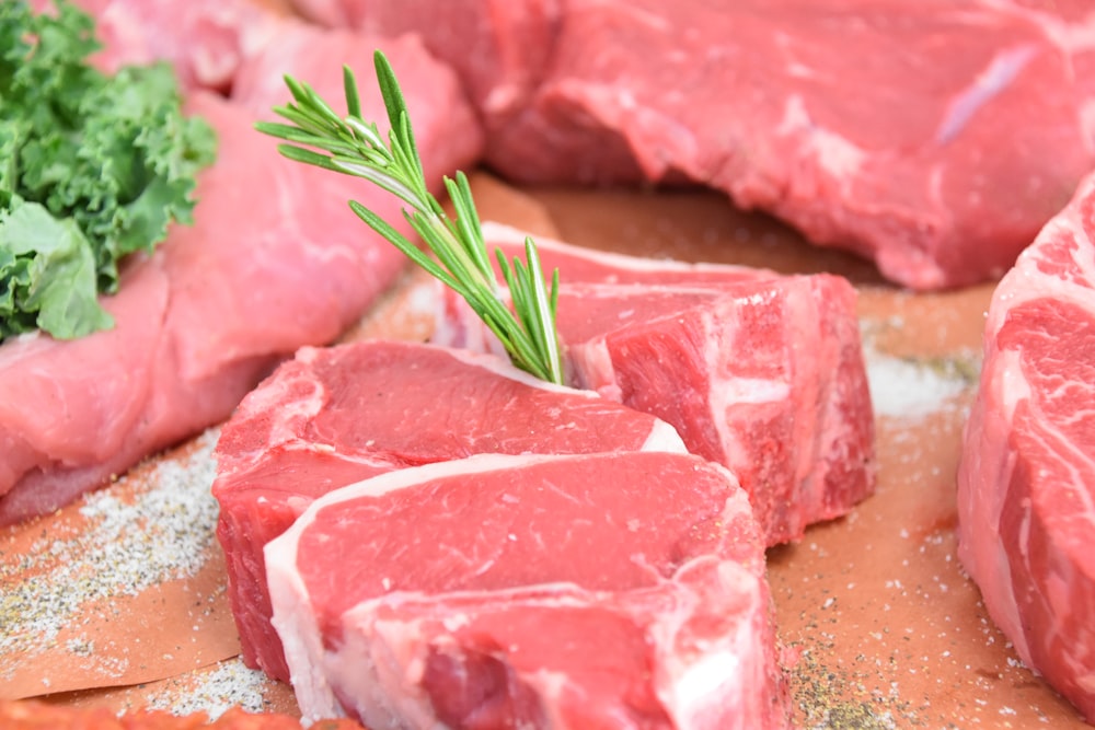 raw meat with green leaves