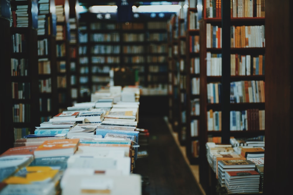 books on black wooden book shelf