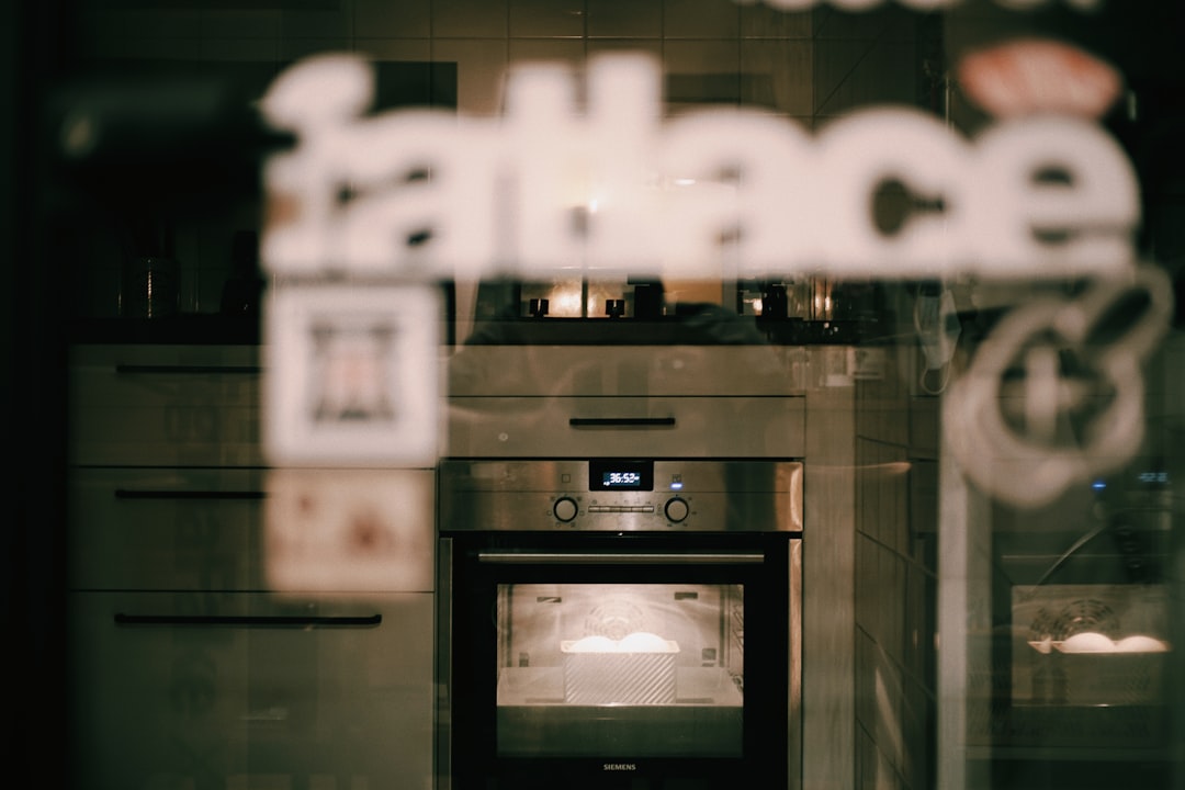  white and black wooden cabinet oven