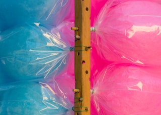 brown wooden stick on blue plastic bag