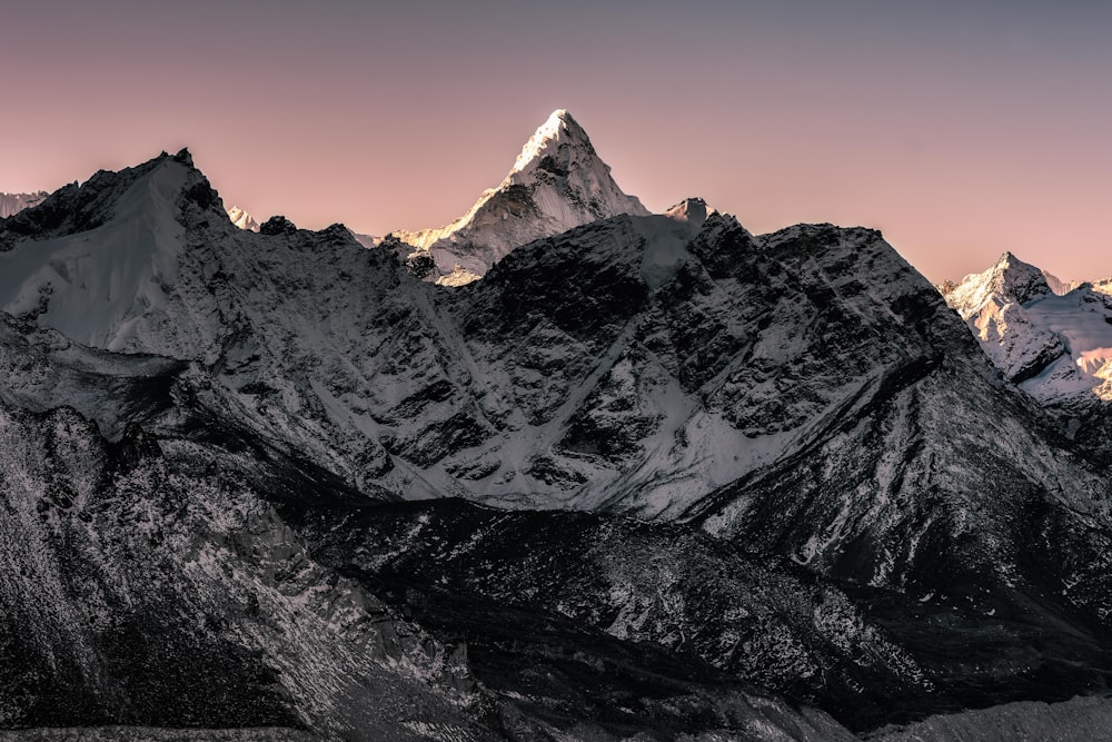 snow covered mountain during daytime